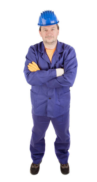 istock A man in work clothes with his arms crossed. 1783869126