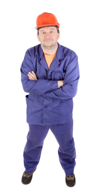istock A man in work clothes with his arms crossed. 1783869131