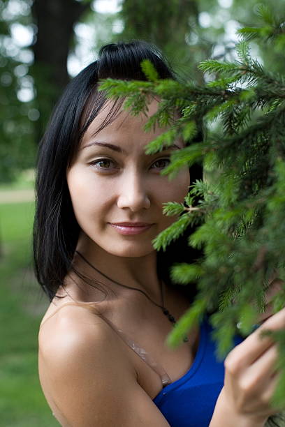 istock Female Asian appearance against summer forest 178386963