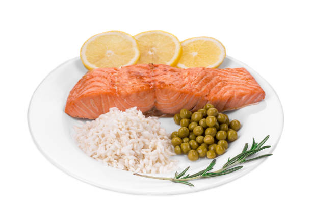 istock Grilled salmon fillet with risotto and peas. 1783871028