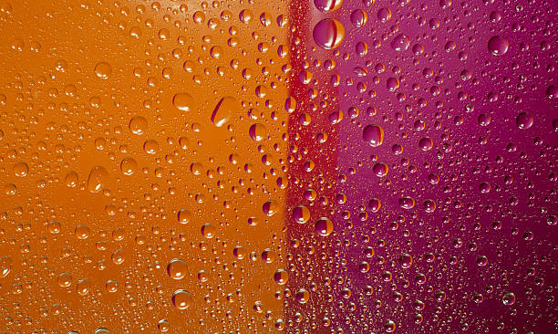 istock Water drops, orange and magenta colors, background 178387455