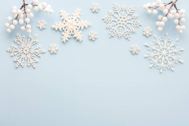 istock White snowflakes on a blue background 1783881563