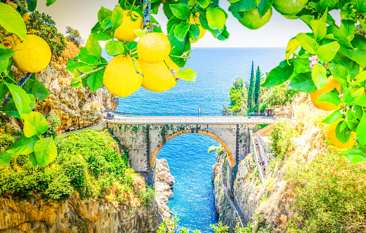 famous picturesque road viaduct of Amalfitana summer coast, Italy toned image