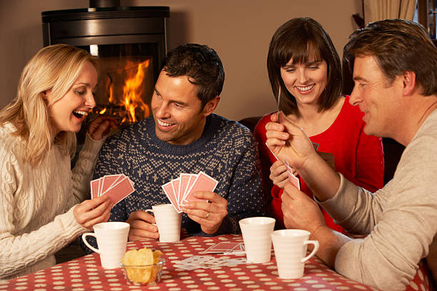 istock Group Of Middle Aged Couples Playing Cards Together 178388634