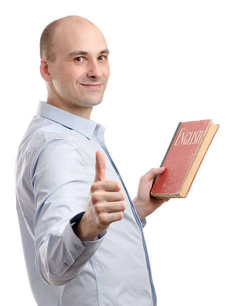 istock man holding an English book 178388779