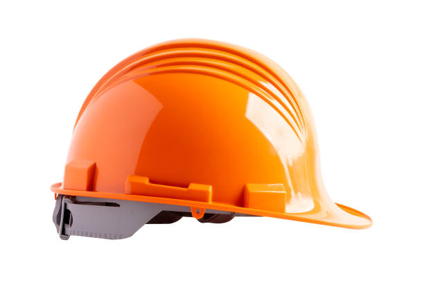 istock Orange construction helmet isolated on white background with clipping path, engineer safety concept. 1783888360