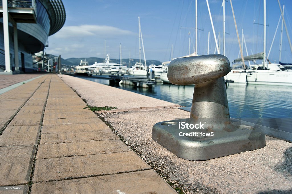 Bollard in Loano "Bollard on the wharf of the port in Loano, Liguria, Italia" Architectural Feature Stock Photo