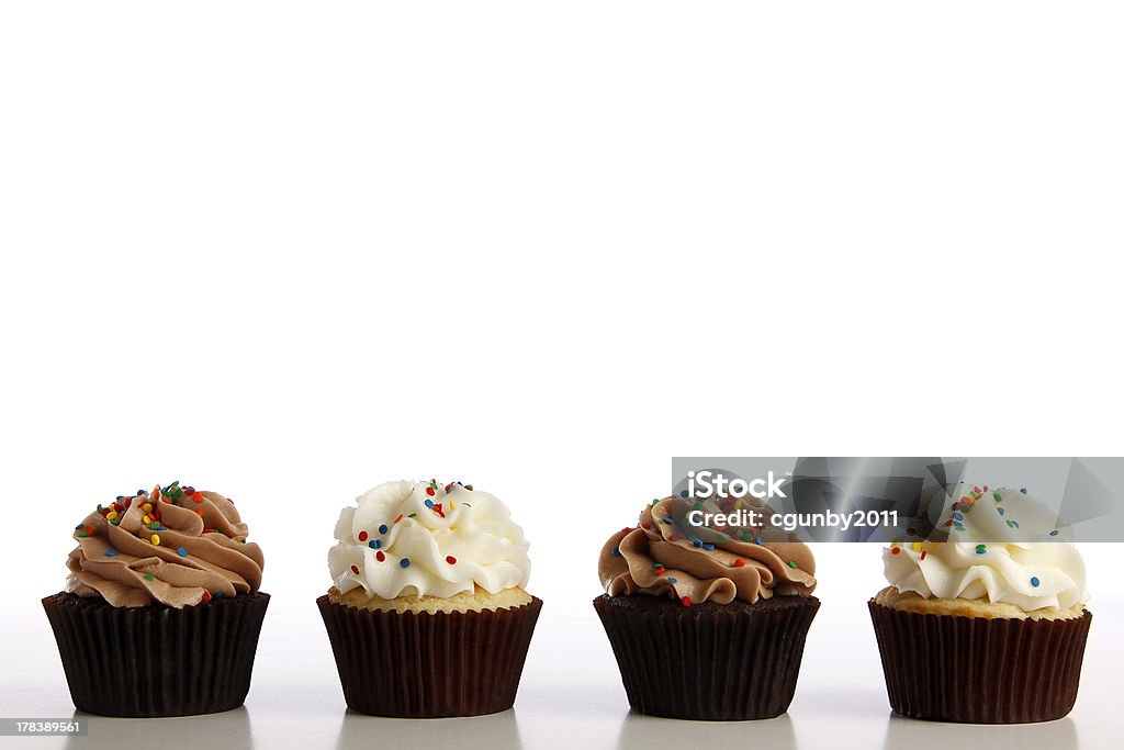 Line of Cupcakes Line of four Cupcakes Cupcake Stock Photo