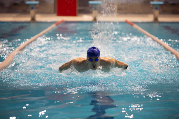 istock A skilled athlete showcases the butterfly stroke in an Olympic-sized pool. 1783902205