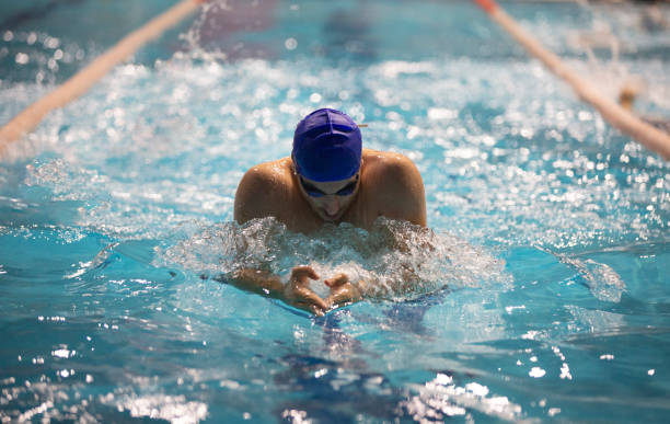 istock A skilled athlete showcases the breaststroke in an Olympic-sized pool. 1783902213