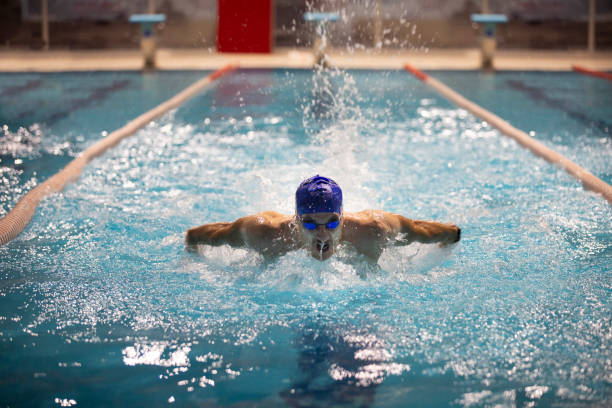 istock A skilled athlete showcases the butterfly stroke in an Olympic-sized pool. 1783902787