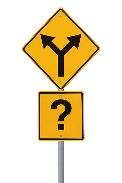 istock Yellow road sign showing two directions and a question mark 178390445