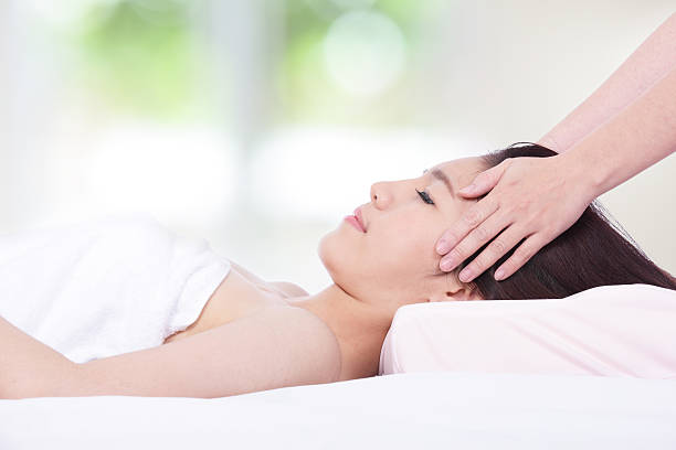 istock woman lying on a massage table in health spa 178390906