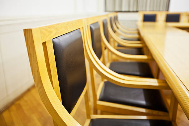 istock Wood and leather chair in a conference room 178391432