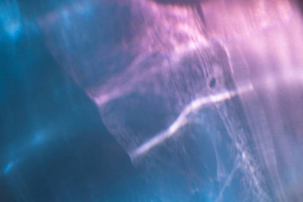 istock Abstract pink and blue water ripple texture overlay 1783924980