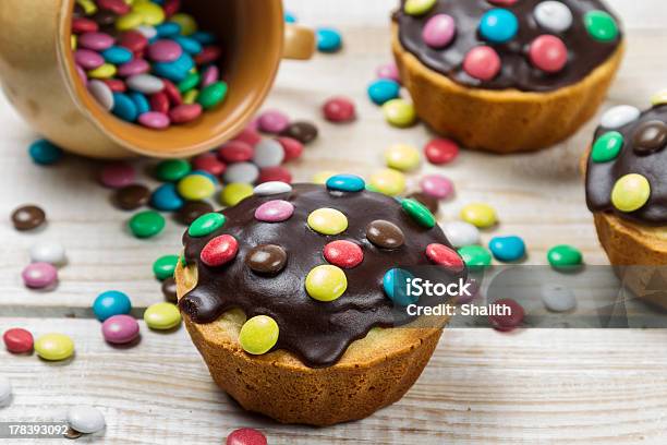Decorating Easter Muffins With Chocolate Glaze Stock Photo - Download Image Now - Baked, Baked Pastry Item, Cake