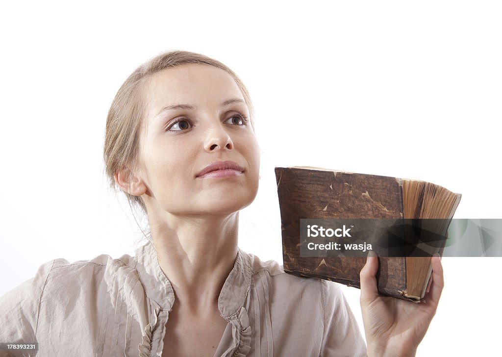 Mujer agarrando antiguo libro, aislado - Foto de stock de Adulto libre de derechos