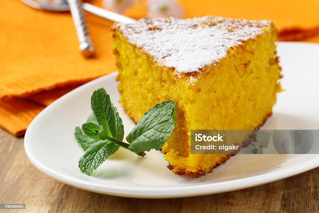 Carrot cake with powdered sugar and mint Carrot Cake Stock Photo