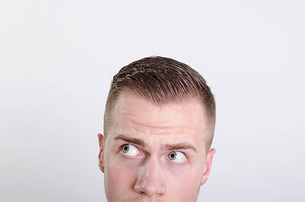 istock Close-up of businessman looking up 178394105