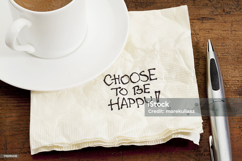 choose to be happy on a napkin choose to be happy advice - a doodle handwriting on a napkin with a cup of coffee Advice Stock Photo