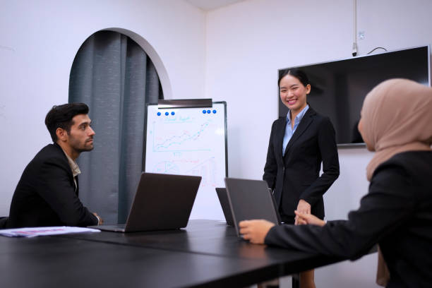 istock White collar workers are meeting at office. 1783945149