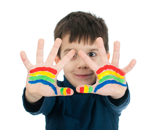 istock Boy hands painted with colorful paint 178394910