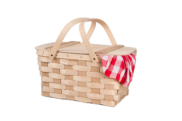 Picnic basket and table cloth stock photo
