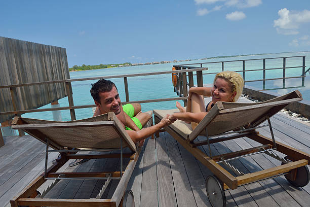 istock happy   couple at summer vacation have fun and relax 178395366