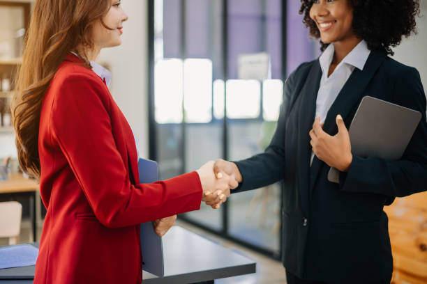 istock Two confident business man shaking hands during a meeting in the office, success, dealing, greeting and partner 1783955571