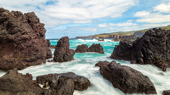 The rough north coast with its black rocks on the Portuguese island of Terceira in the Azores
