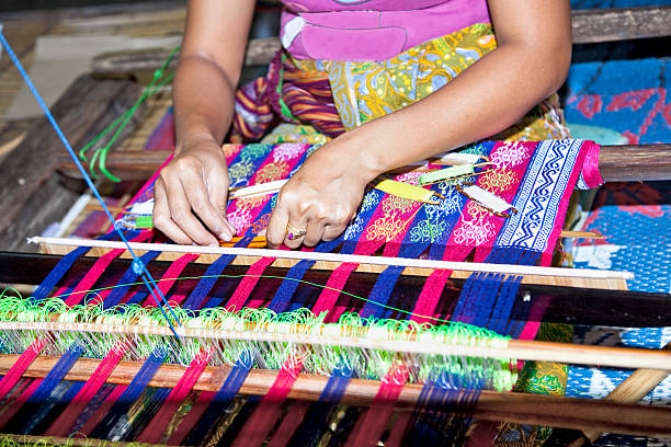 istock Sasak tribe lady weaving, Lombok 178395929