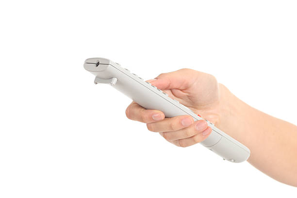 istock Beautiful woman hand with a tv remote control 178396227