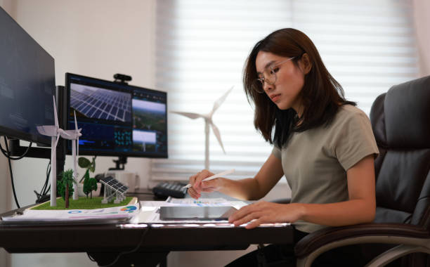 istock The female designer uses professional 3D software applications to work on new wind turbine prototypes  in the  office 1783964492