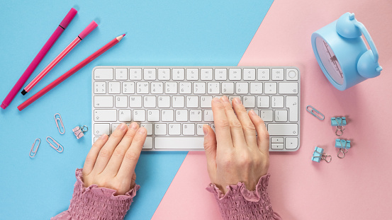 Single hand typing on a keyboard, Woman using Computer Keyboard