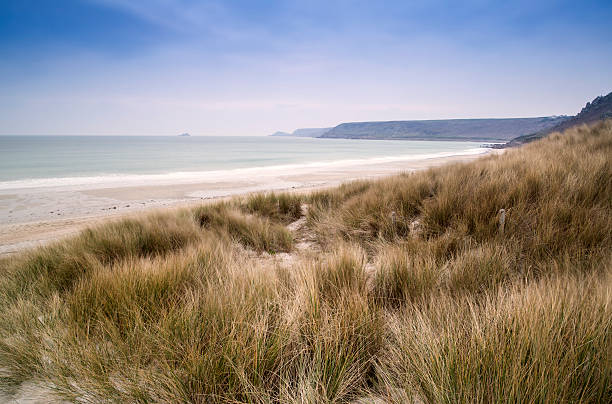istock Sennen Cove beach and sand dunes before sunset 178396489