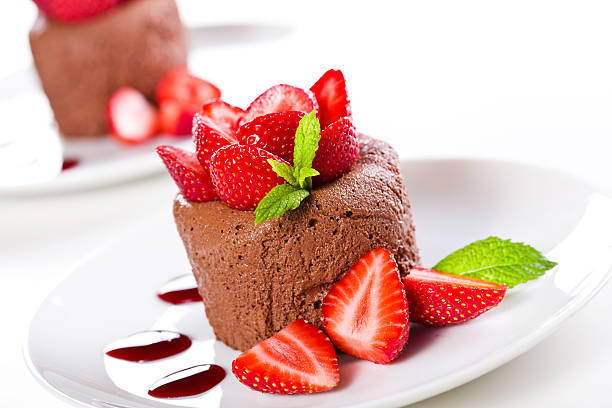 istock Chocolate mousse with strawberries on white plate 178396642