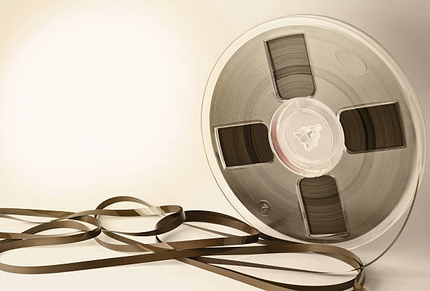 Vintage magnetic audio reel and tangled tape with space for text