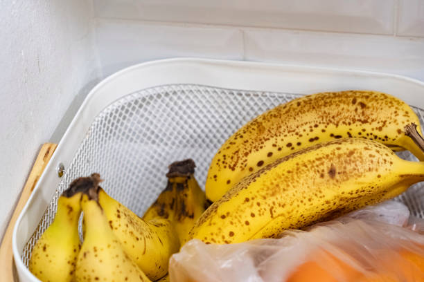 istock Yellow bananas fruit on a white shelf in a domestic kitchen scene 1783968562