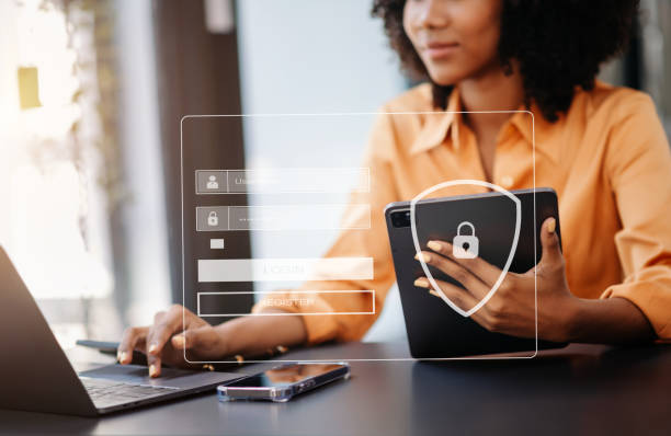 Cyber security concept, Login, User, identification information security and encryption, secure access to user's personal information woman using smart phone and tablet in office Cyber security concept, Login, User, identification information security and encryption, secure access to user's personal information woman using smart phone and tablet bank safety stock pictures, royalty-free photos & images