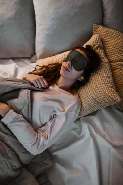 istock Female Enjoying Deep Rest With Eye Mask And Ear Plugs 1783973413