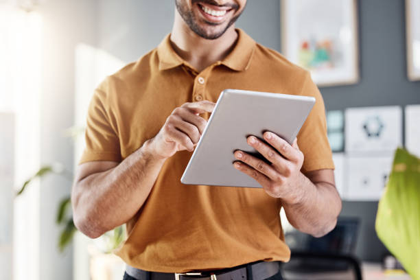 istock Tablet, hands and happy business man working on UX web design, app wireframe development or online software. SEO algorithm, web traffic statistics and person typing webdesign for website layout 1783973970