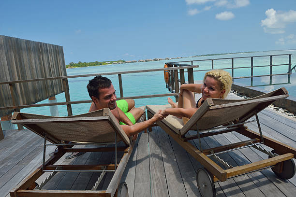 istock happy   couple at summer vacation have fun and relax 178397752