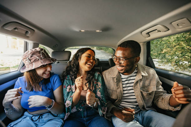 istock Having fun at the back seat of car 1783978105