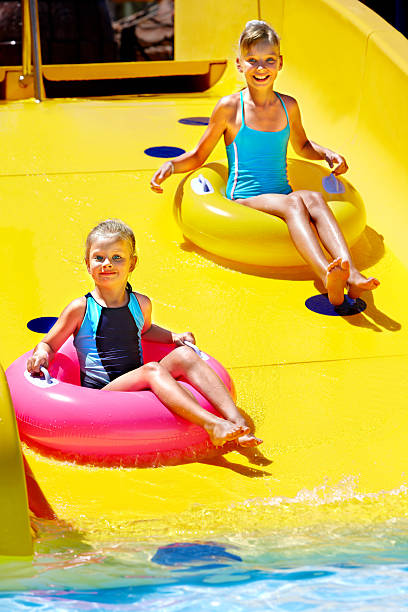 istock Child on water slide at aquapark. 178398696