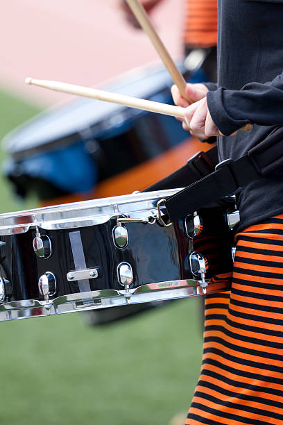 istock Girl playing the drum 178399647