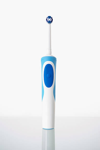 istock Toothbrush standing on glass shelf 178399699