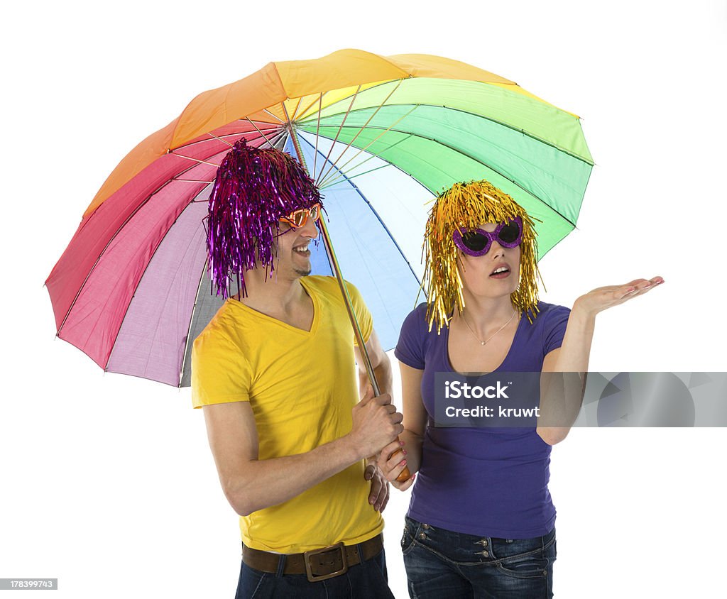 Funny Dressed Couple With Umbrella Looking For Rain Stock Photo - Download  Image Now - iStock