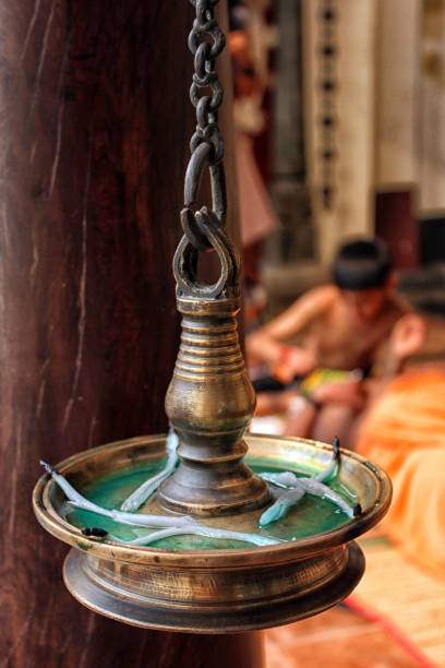istock a hanging birdbath on a long chain inside of a building 1783998153