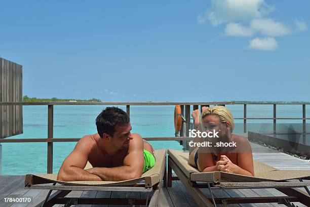 Happy Young Couple At Summer Vacation Have Fun And Relax Stock Photo - Download Image Now