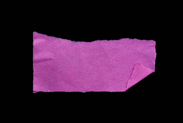 istock Ripped paper piece isolated on a black background 1784001711